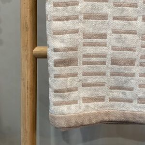 Blush pink and white throw blanket